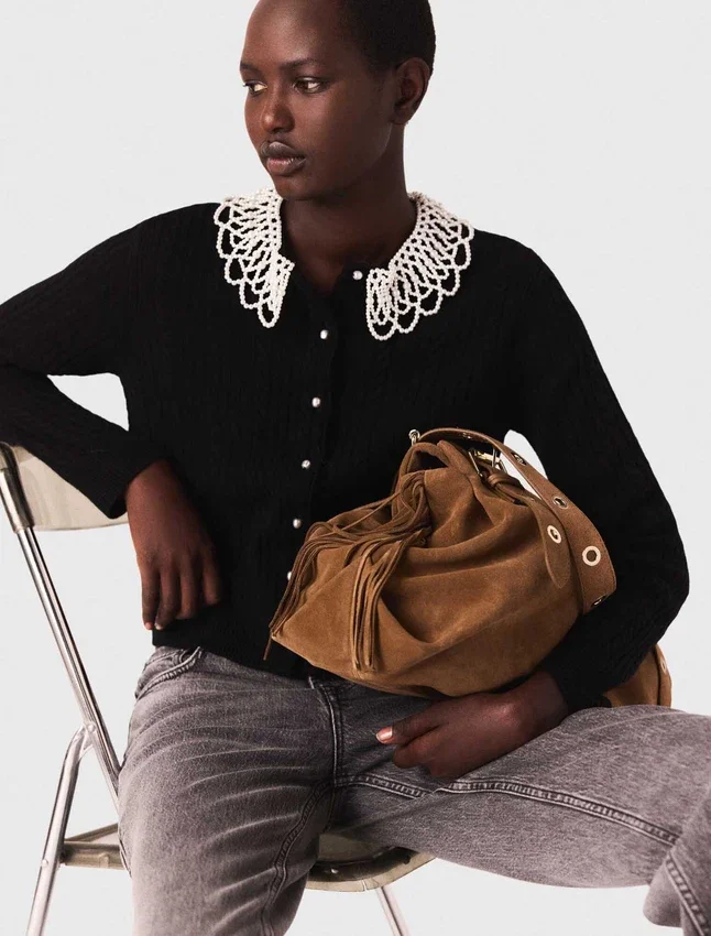 Cardigan with removable beaded collar Cardigan with removable beaded collar