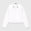 Cropped shirt with jewel detail