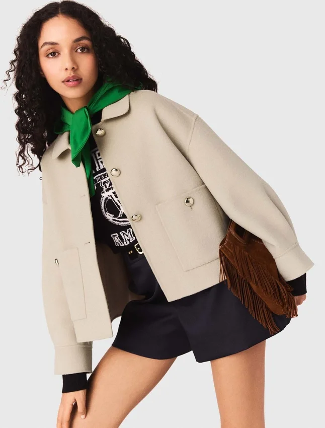 Cropped wool jacket with pleated back Cropped wool jacket with pleated back
