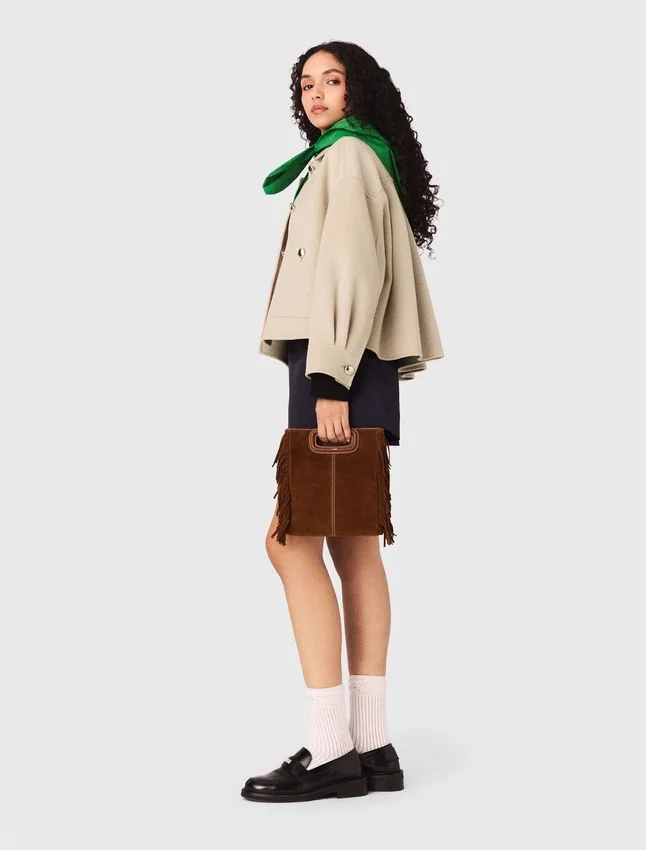 Cropped wool jacket with pleated back Cropped wool jacket with pleated back
