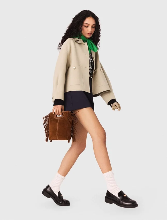 Cropped wool jacket with pleated back Cropped wool jacket with pleated back