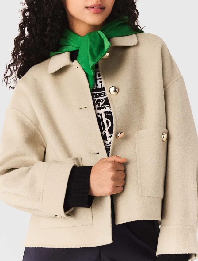 Cropped wool jacket with pleated back Cropped wool jacket with pleated back