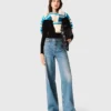 Flared jeans with chain