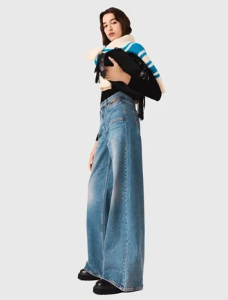 Flared jeans with chain