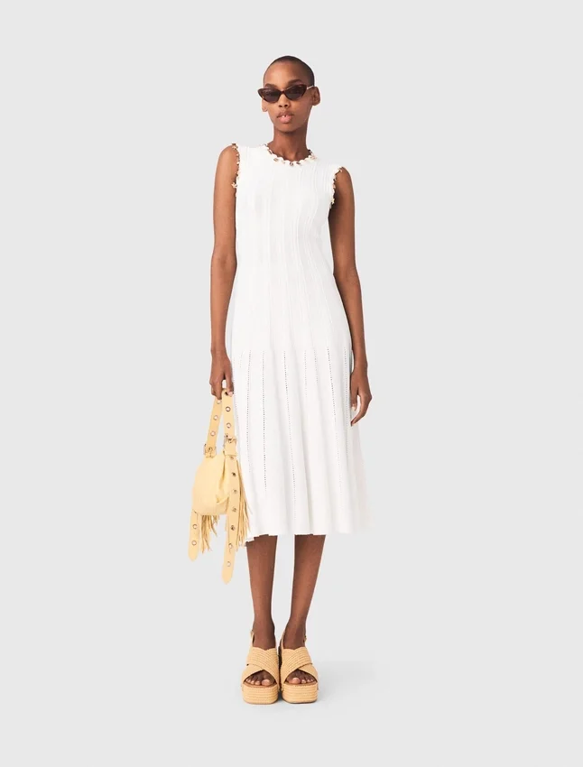 Knit dress with gold jewellery Knit dress with gold jewellery