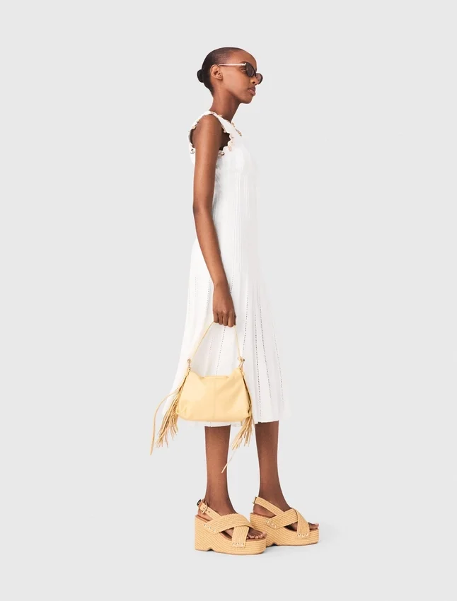 Knit dress with gold jewellery Knit dress with gold jewellery