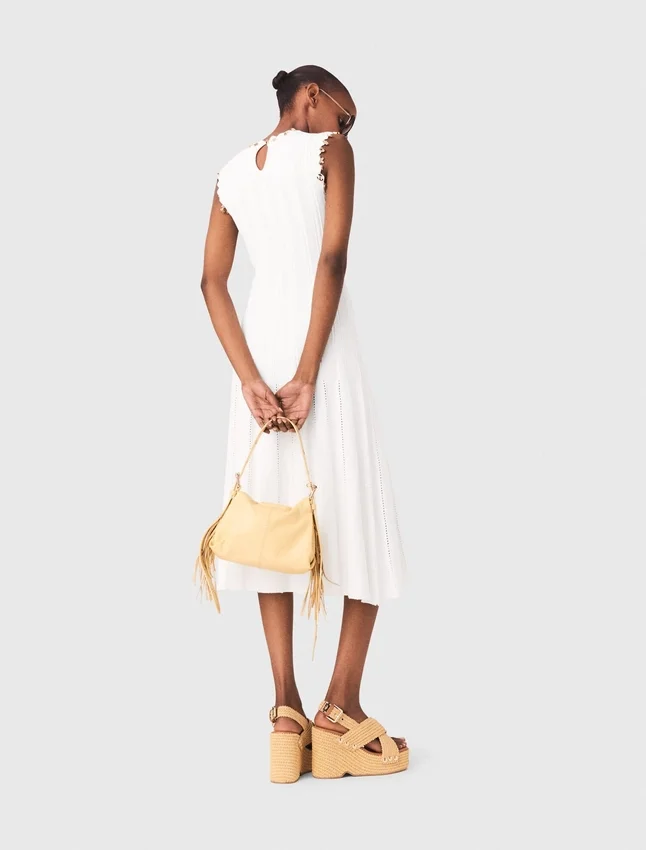 Knit dress with gold jewellery Knit dress with gold jewellery