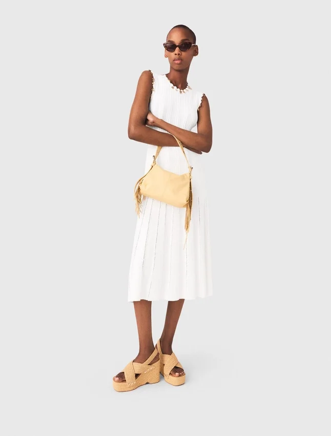 Knit dress with gold jewellery Knit dress with gold jewellery