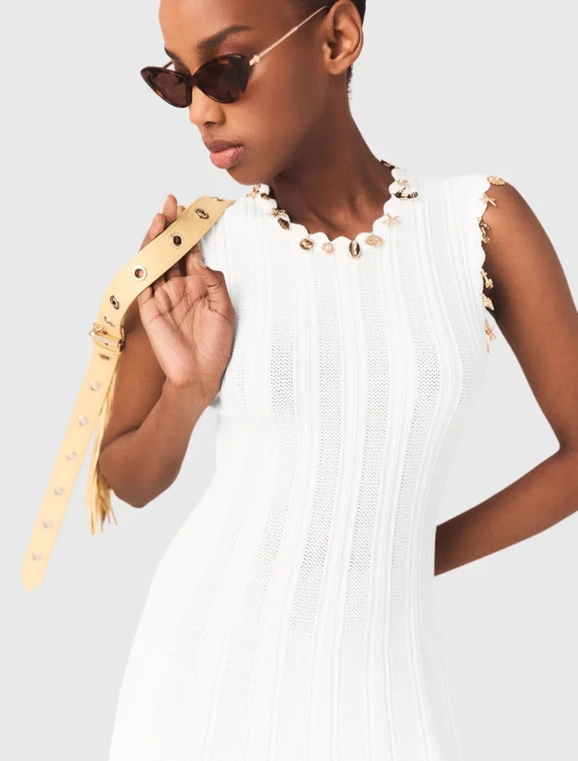 Knit dress with gold jewellery Knit dress with gold jewellery