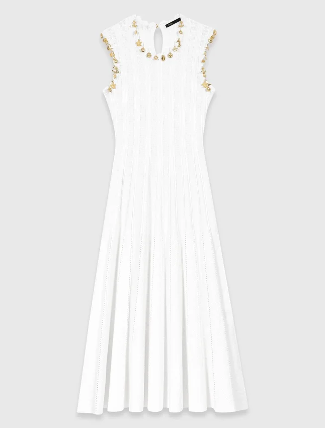 Knit dress with gold jewellery Knit dress with gold jewellery