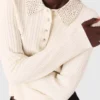 Knit polo shirt with rhinestone collar