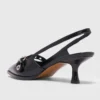 Leather pumps with eyelet strap
