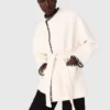 Lined coat with contrasting ribbon