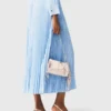 Long pleated dress with eyelets