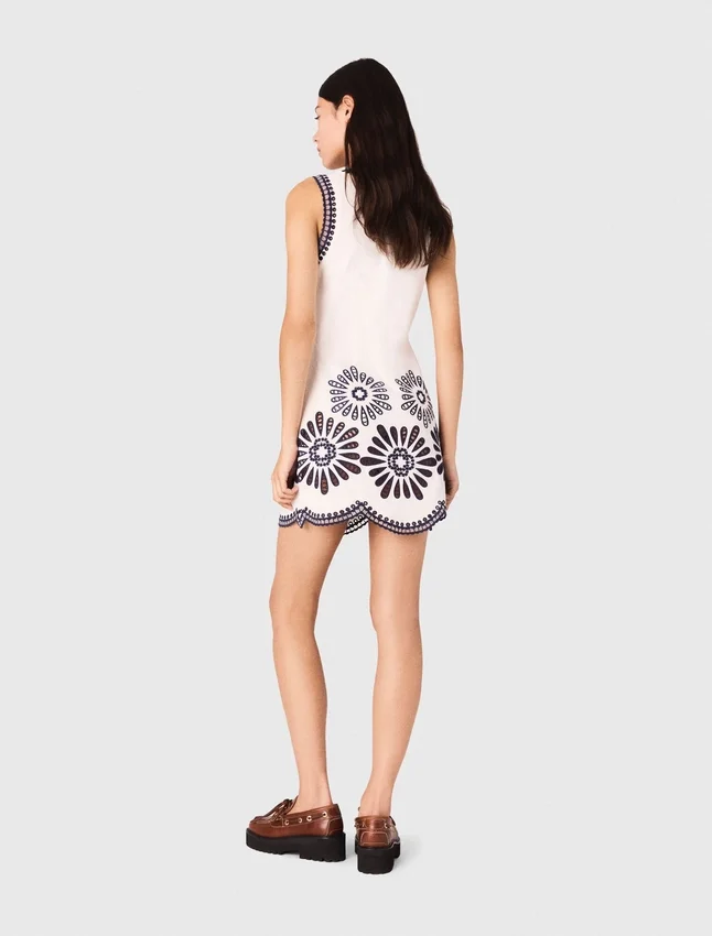 Mini dress with crochet details Mini dress with crochet details