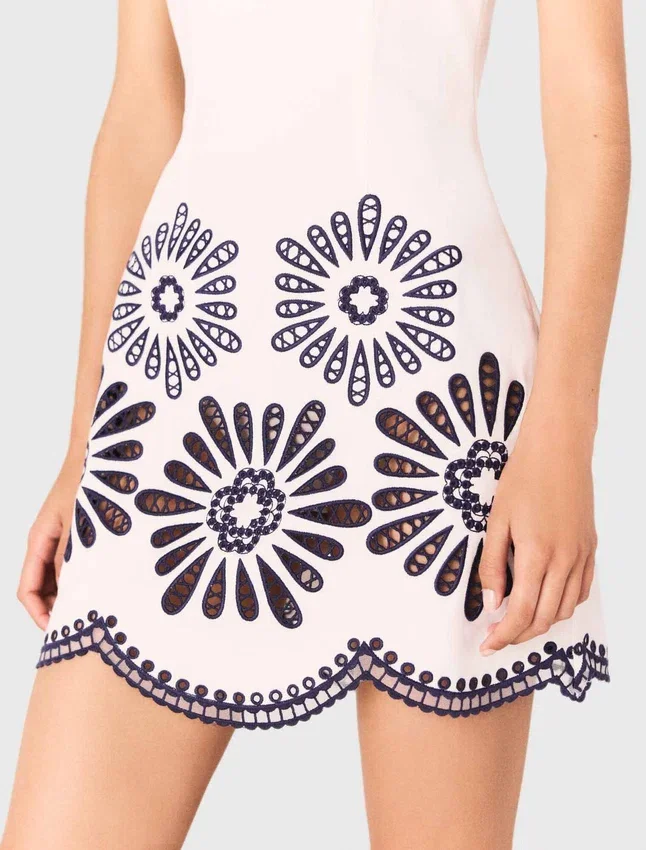 Mini dress with crochet details Mini dress with crochet details