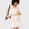 Mini topstitched knit skirt