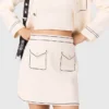 Mini topstitched knit skirt