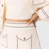 Mini topstitched knit skirt