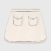 Mini topstitched knit skirt
