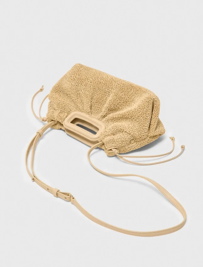 Mipli bouclé effect clutch bag Mipli bouclé effect clutch bag