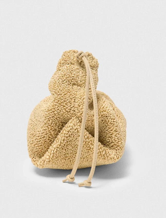 Mipli bouclé effect clutch bag Mipli bouclé effect clutch bag