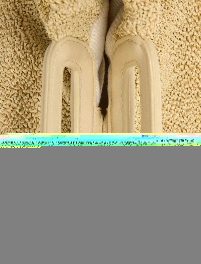 Mipli bouclé effect clutch bag Mipli bouclé effect clutch bag