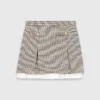 Pleated skirt with poplin details