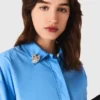 Shirt with removable jewellery