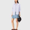 Short pleated denim skirt with strass
