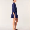 Short satin-effect pleated dress