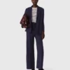 Suit jacket with pleated back