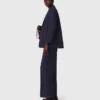 Suit jacket with pleated back
