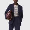 Suit jacket with pleated back