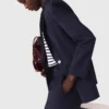 Suit jacket with pleated back