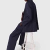 Suit jacket with pleated back