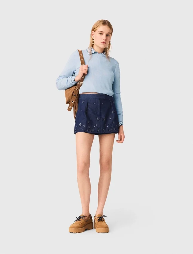 Sweater with jeweled bows on back Sweater with jeweled bows on back