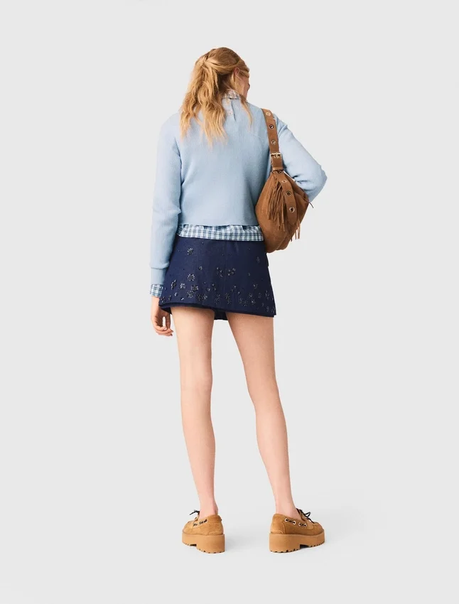 Sweater with jeweled bows on back Sweater with jeweled bows on back