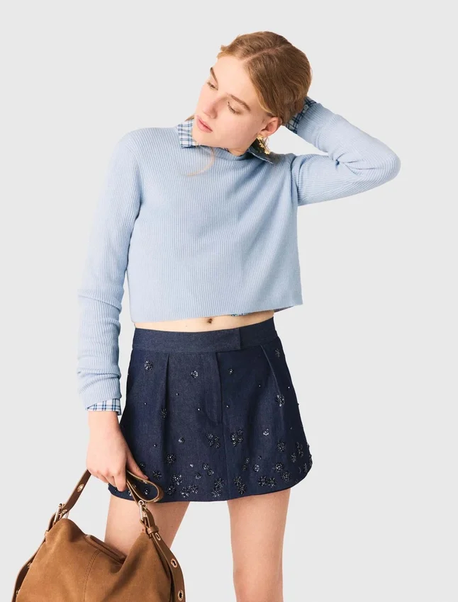 Sweater with jeweled bows on back Sweater with jeweled bows on back