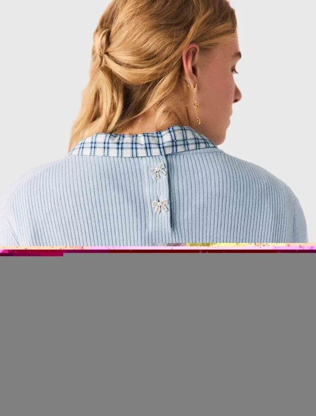Sweater with jeweled bows on back Sweater with jeweled bows on back