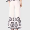Trousers with crochet detail