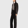 Trousers with rhinestone band