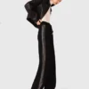 Trousers with rhinestone band