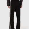 Trousers with rhinestone band