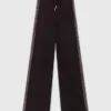 Trousers with rhinestone band
