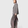 Wide-leg jeans with chain-link belt